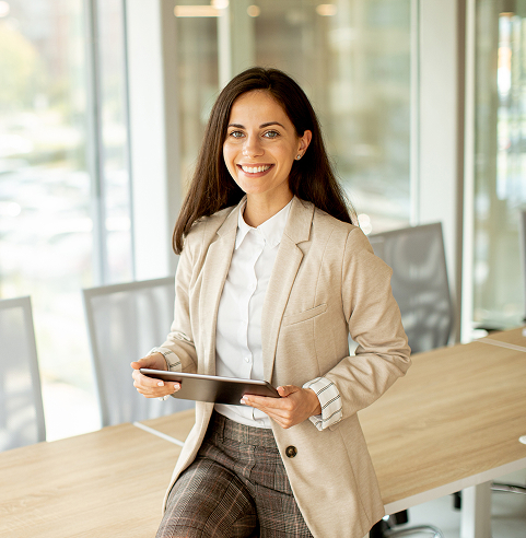 woman with tablet smiling